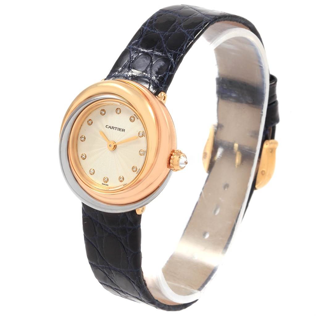 The Cartier Trinity W200246 Women's Yellow Gold Beige Dial W200246 Women's Yellow Gold Beige Dial model watch is shown from a front angle, displaying the dial, bezel, and a partial view of the strap.