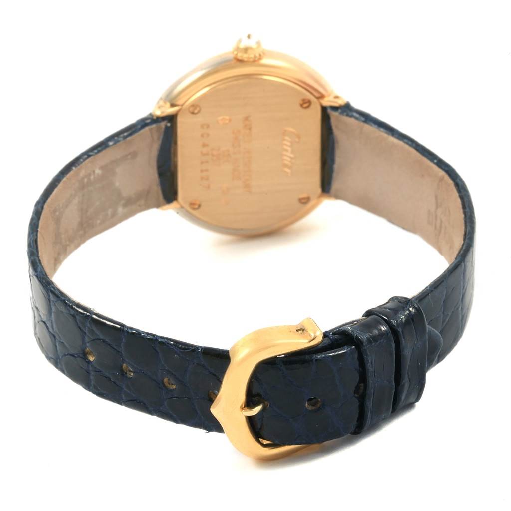 This image shows the back case and strap of the Cartier Trinity W200246 Women's Yellow Gold Beige Dial W200246 Women's Yellow Gold Beige Dial model watch, highlighting the blue leather strap and golden buckle.