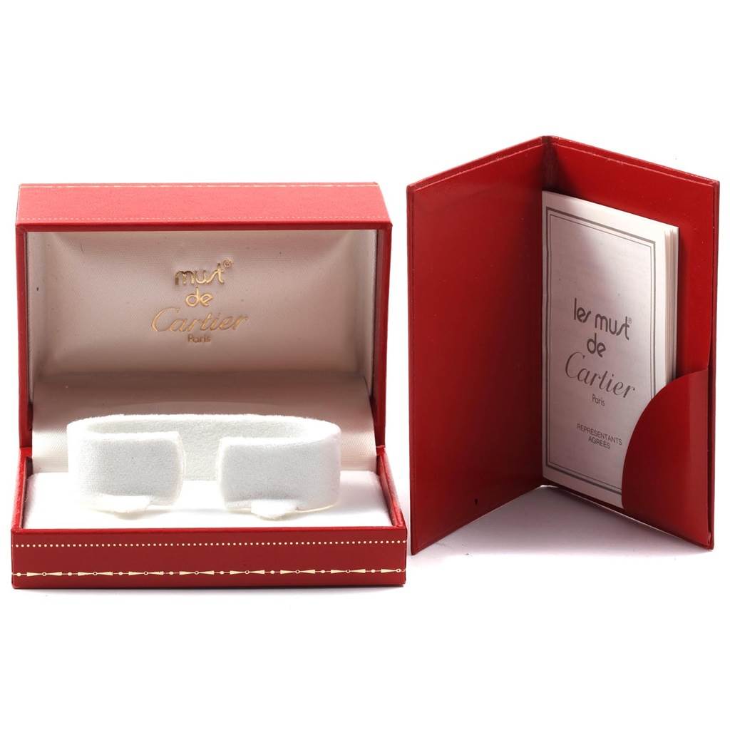The image shows the empty red box and warranty booklet for a Cartier Trinity W200246 Women's Yellow Gold Beige Dial W200246 Women's Yellow Gold Beige Dial watch.
