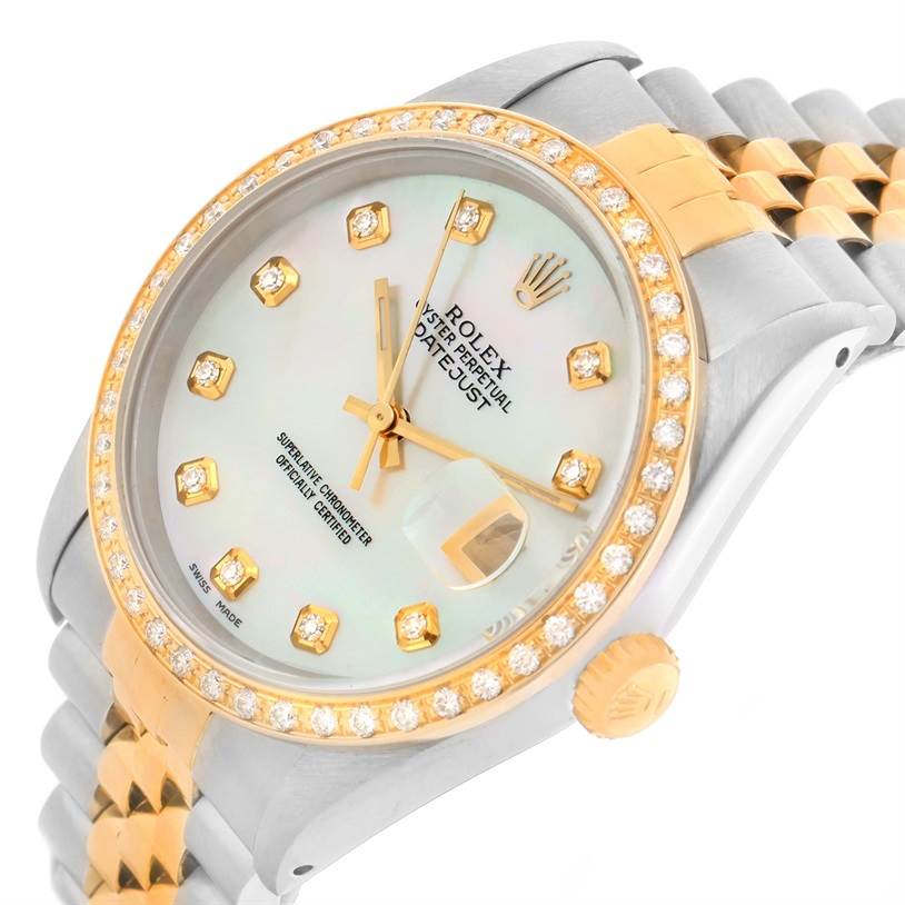 The Rolex Datejust 16233 Men's Steel and Gold (two tone) Mother of Pearl Dial 16233 Men's Steel and Gold (two tone) Mother of Pearl Dial watch is shown at an oblique angle, highlighting its dial, diamond bezel, and two-tone bracelet.