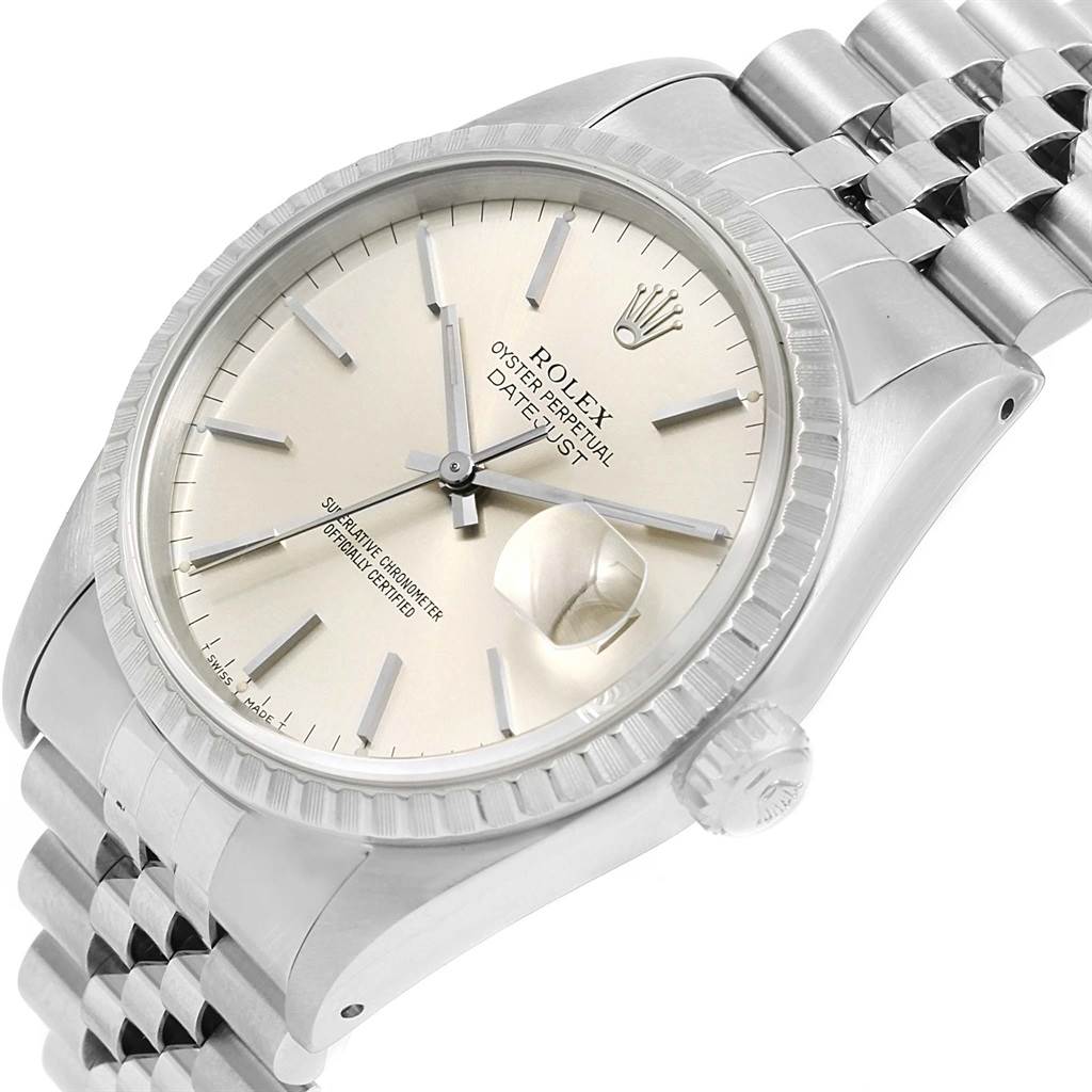 This image shows a close-up angled view of the Rolex Datejust 16220 Men's Stainless Steel Silver Dial 16220 Men's Stainless Steel Silver Dial watch, displaying its dial, crown, bezel, and a portion of the bracelet.