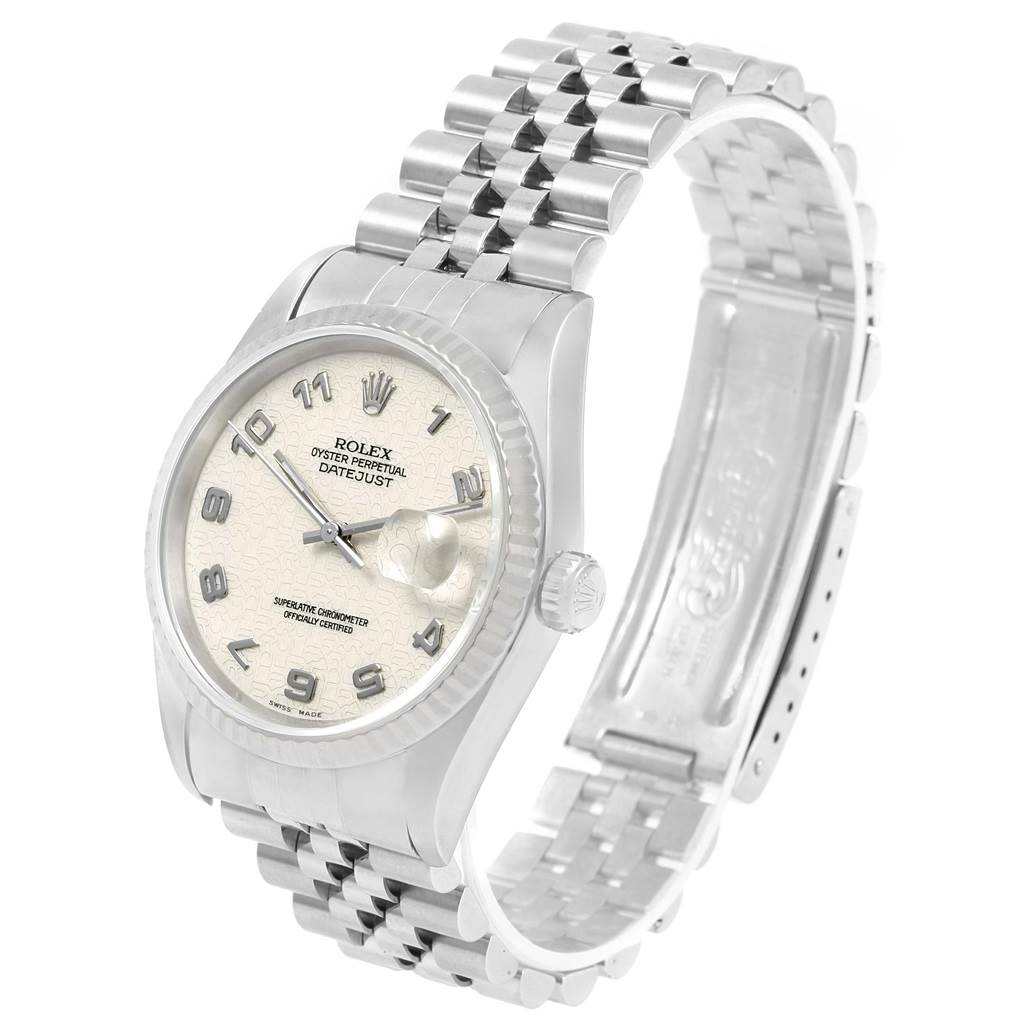 The Rolex Datejust 16234 Men's Stainless Steel Beige Dial 16234 Men's Stainless Steel Beige Dial watch is shown from a three-quarter angle, displaying the face, bezel, crown, and partially open bracelet.