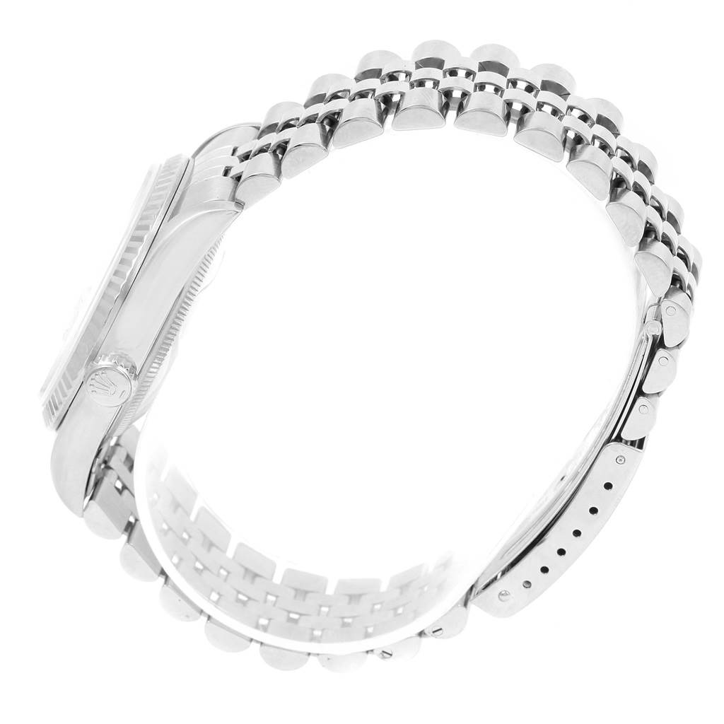 The image shows a side view of a Rolex Datejust 16234 Men's Stainless Steel Beige Dial 16234 Men's Stainless Steel Beige Dial watch highlighting its case and bracelet.