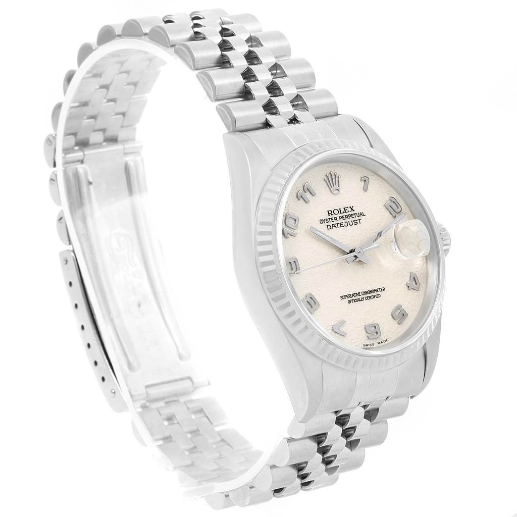 The image shows a side angle of a Rolex Datejust 16234 Men's Stainless Steel Beige Dial 16234 Men's Stainless Steel Beige Dial watch, highlighting the face dial, bezel, and bracelet.