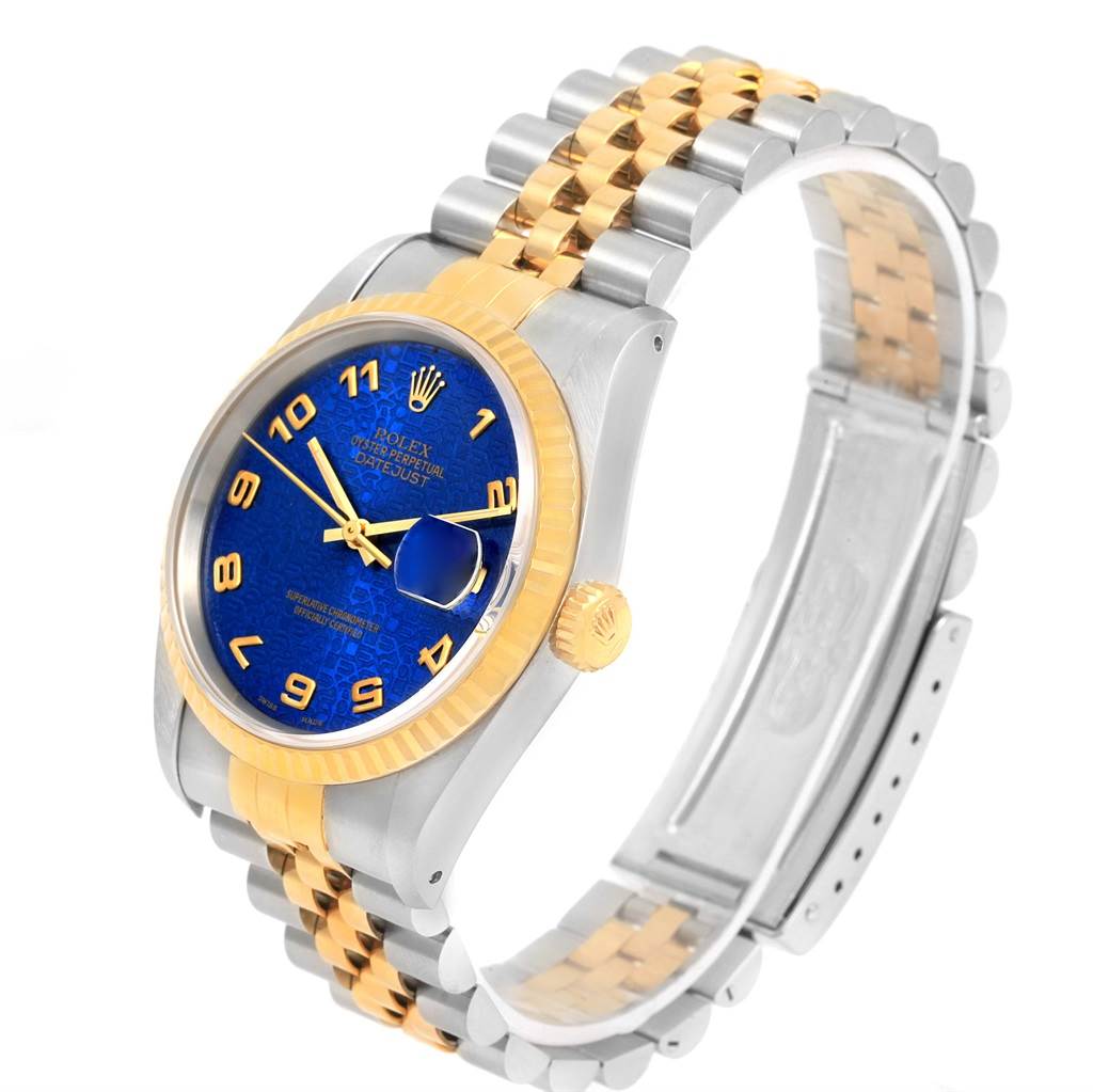 The image shows a Rolex Datejust 16233 Men's Steel and Gold (two tone) Blue Dial 16233 Men's Steel and Gold (two tone) Blue Dial model watch at an angle highlighting the dial, crown, and Jubilee bracelet.