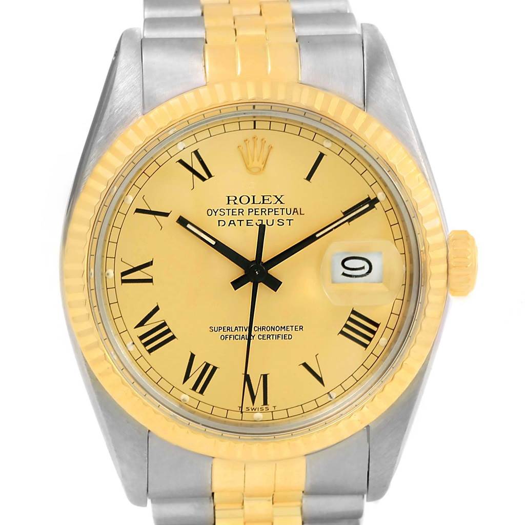 The image shows a front view of a Rolex Datejust 16013 Men's Stainless Steel Champagne Dial 16013 Men's Stainless Steel Champagne Dial watch, featuring a yellow dial, Roman numerals, and a two-tone bracelet.