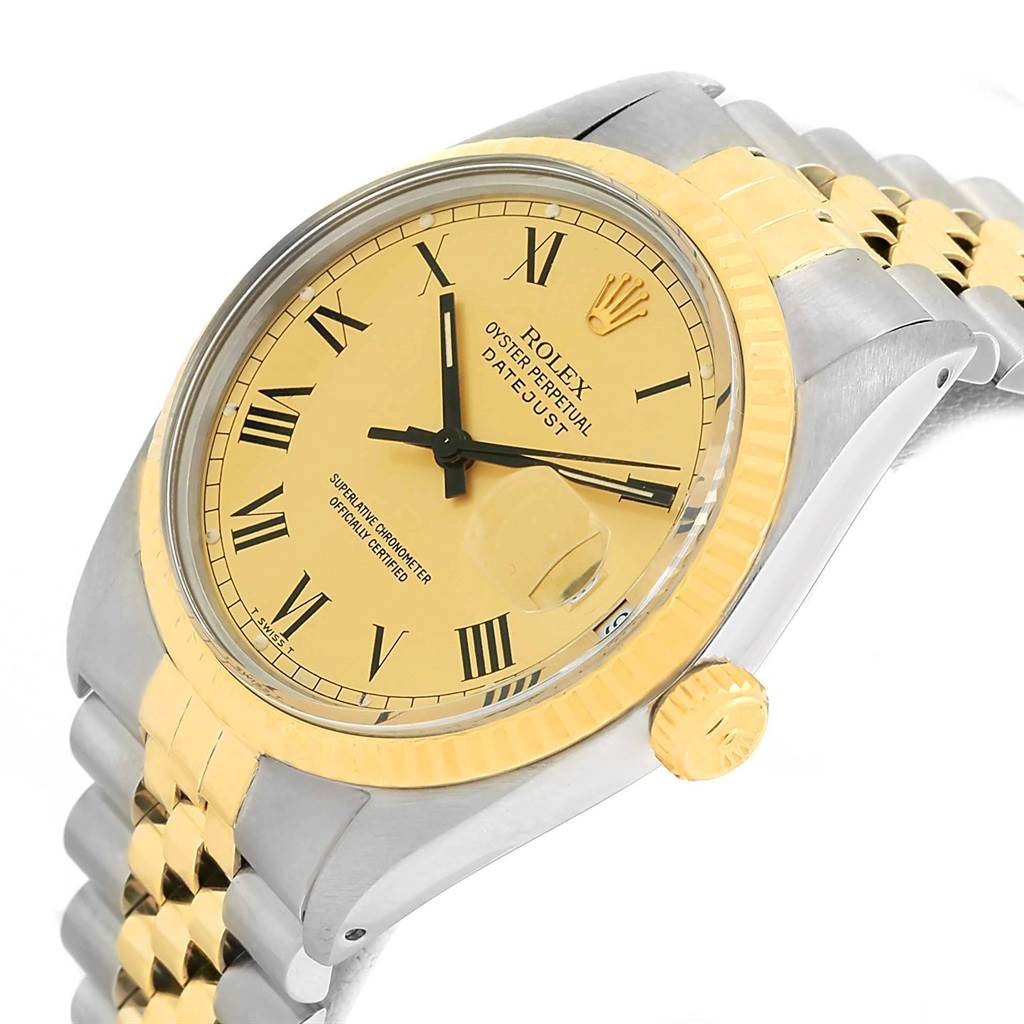 This Rolex Datejust 16013 Men's Stainless Steel Champagne Dial 16013 Men's Stainless Steel Champagne Dial watch is shown from a slight side angle, highlighting its two-tone bracelet, fluted bezel, dial, and crown.
