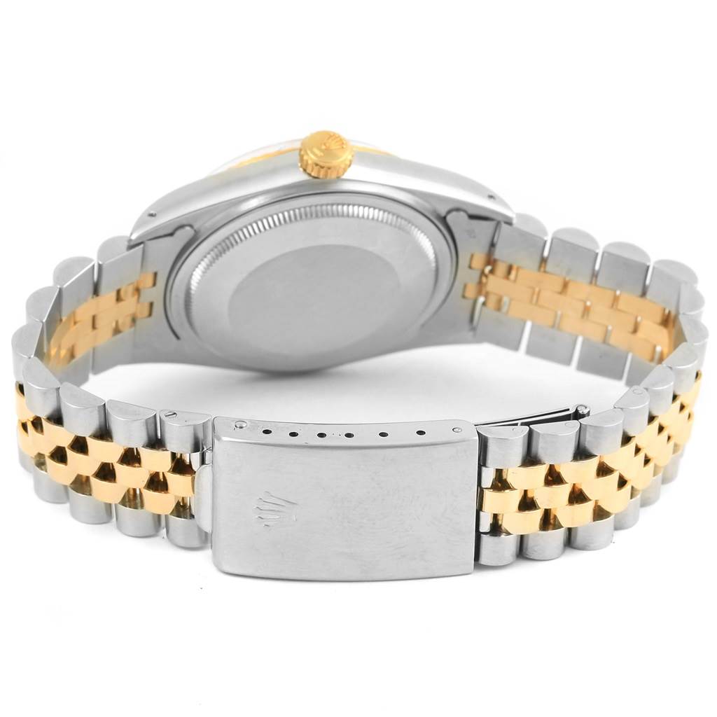 The image shows the back view of a Rolex Datejust 16013 Men's Stainless Steel Champagne Dial 16013 Men's Stainless Steel Champagne Dial, highlighting the closed clasp and two-tone metal bracelet.