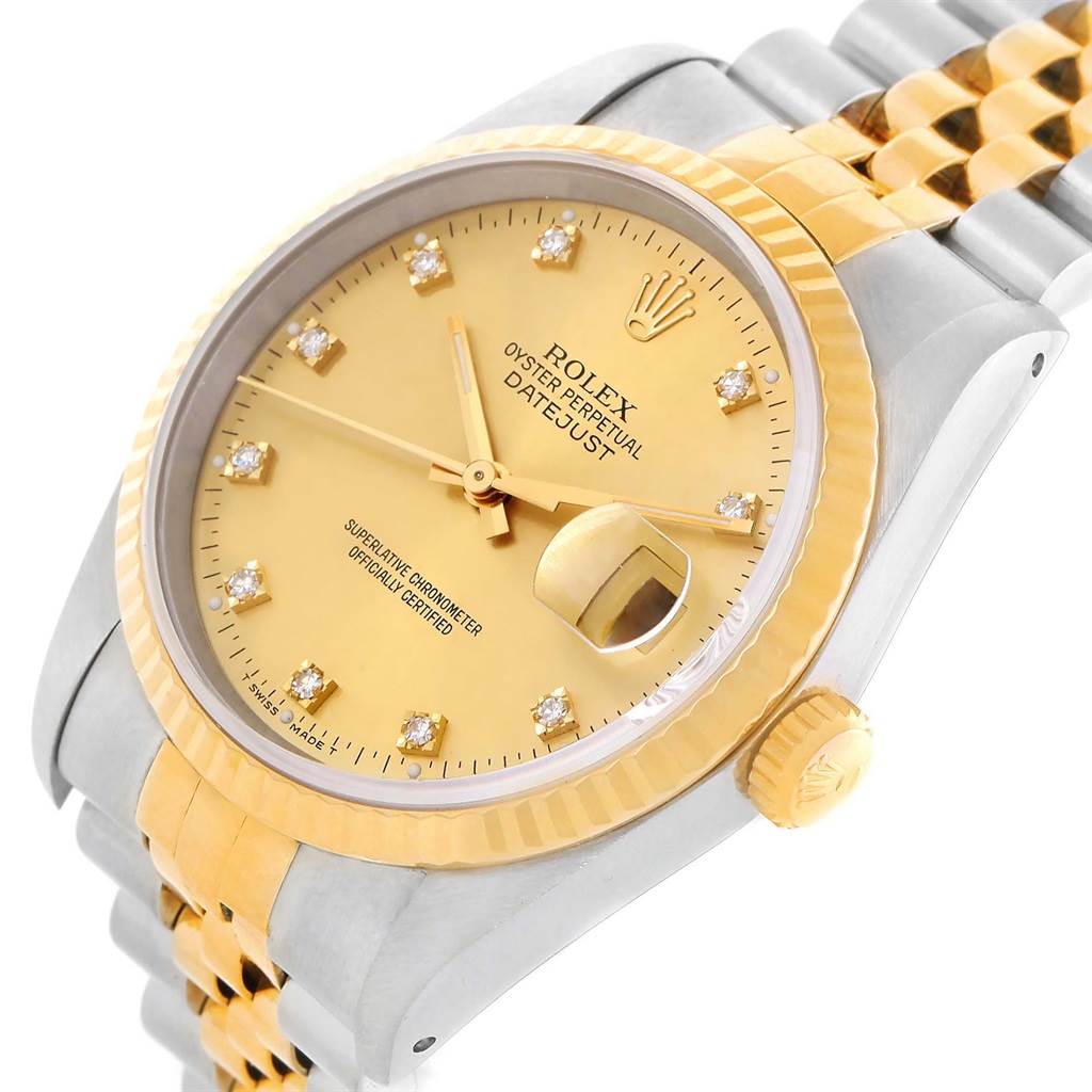 The image shows the face, crown, and part of the bracelet of a Rolex Datejust 16013 Men's Stainless Steel Champagne Dial 16013 Men's Stainless Steel Champagne Dial watch at an angled close-up view.