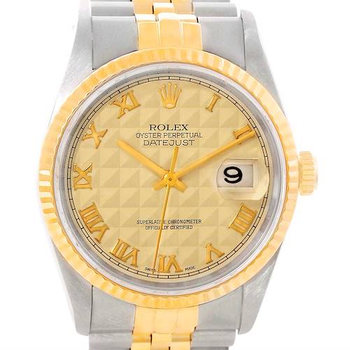 This image shows a close-up of a Rolex Datejust 16233 Men's Steel and Gold (two tone) Beige Dial 16233 Men's Steel and Gold (two tone) Beige Dial watch, highlighting its dial, hands, date window, and part of its bracelet.