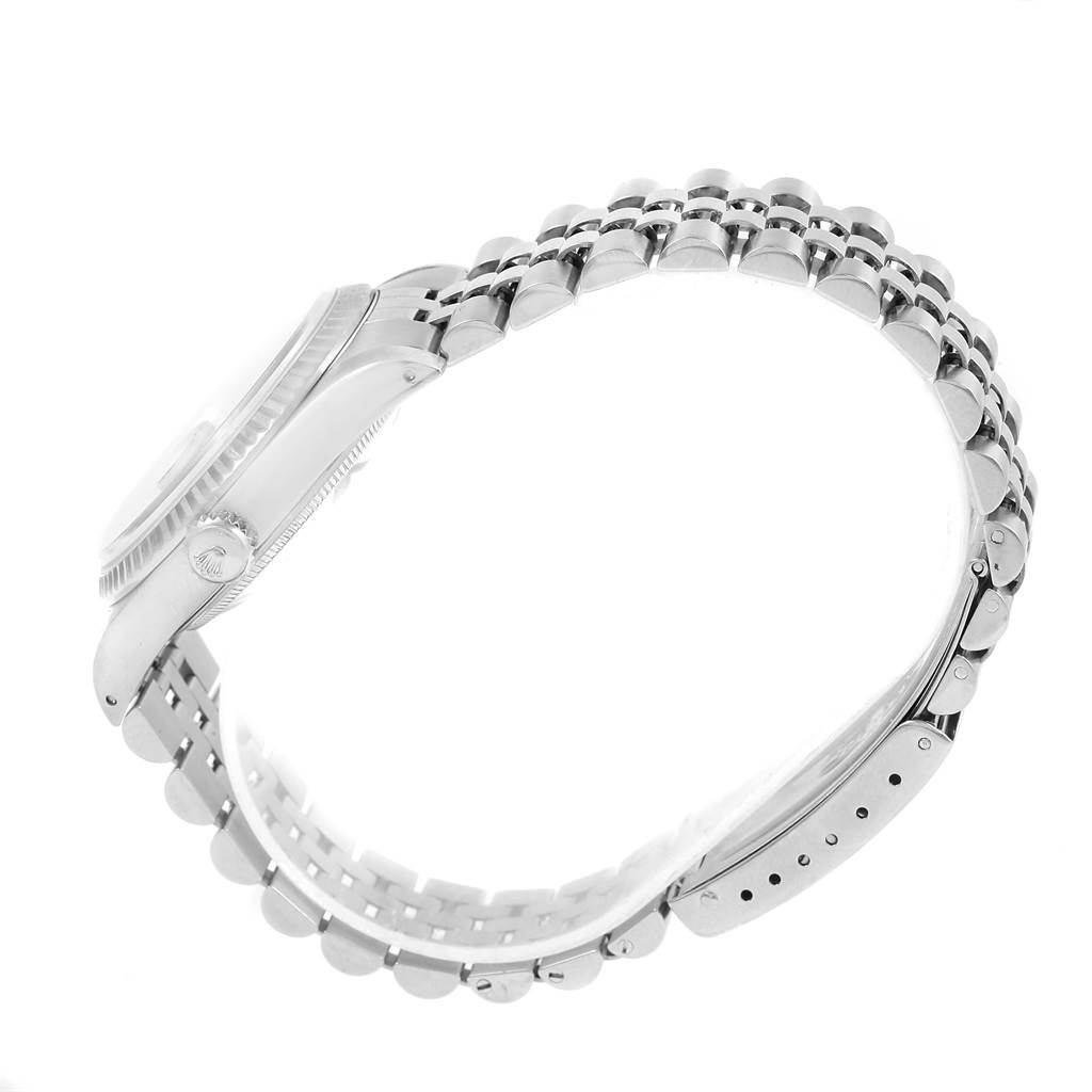 This image shows the side profile and bracelet of a Rolex Datejust 16234 Stainless Steel Silver Dial 16234 Stainless Steel Silver Dial watch.