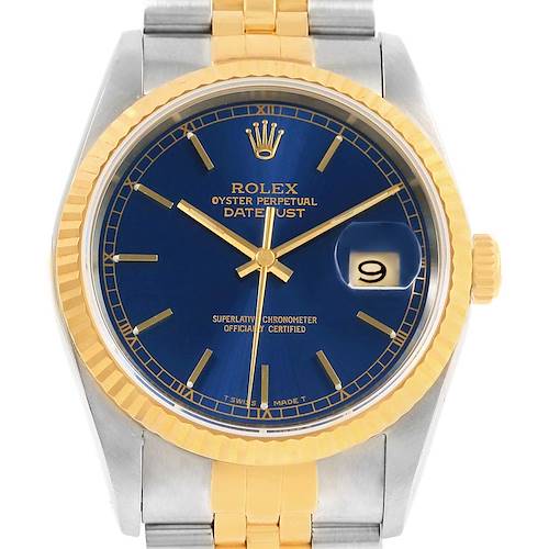 This image shows a close-up of the Rolex Datejust 16233 Men's Steel and Gold (two tone) Blue Dial 16233 Men's Steel and Gold (two tone) Blue Dial watch face and part of its bracelet.
