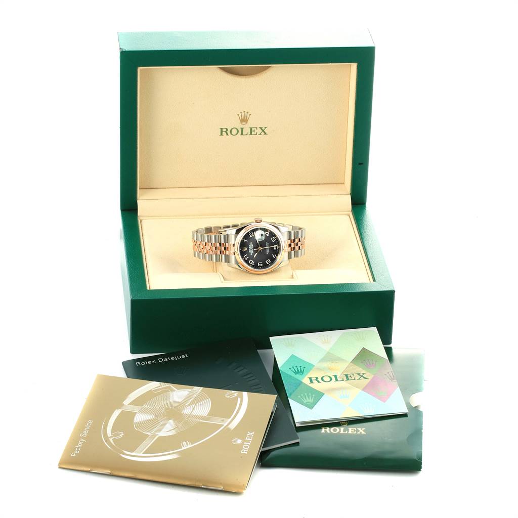 The image shows a Rolex Datejust 116201 Men's Steel and Gold (two tone) Black Dial 116201 Men's Steel and Gold (two tone) Black Dial watch in its open box with booklets and accessories displayed around it.