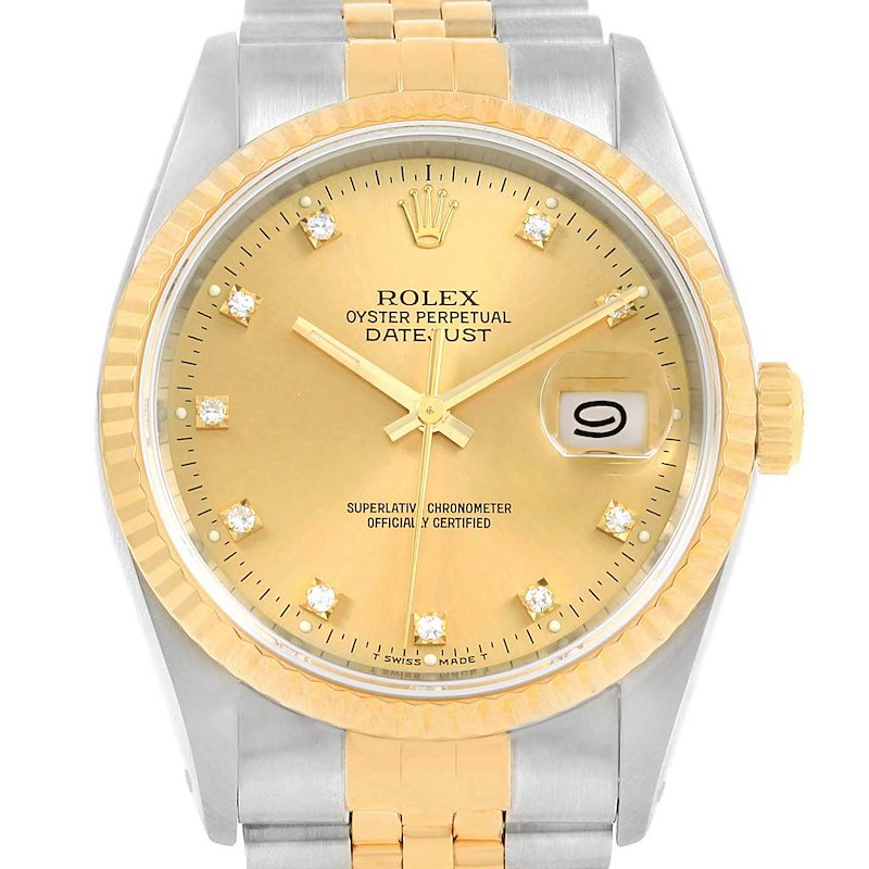 This image shows the face, bezel, and part of the bracelet of a Rolex Datejust 16233 Men's Steel and Gold (two tone) Champagne Dial 16233 Men's Steel and Gold (two tone) Champagne Dial watch in a front-facing angle.