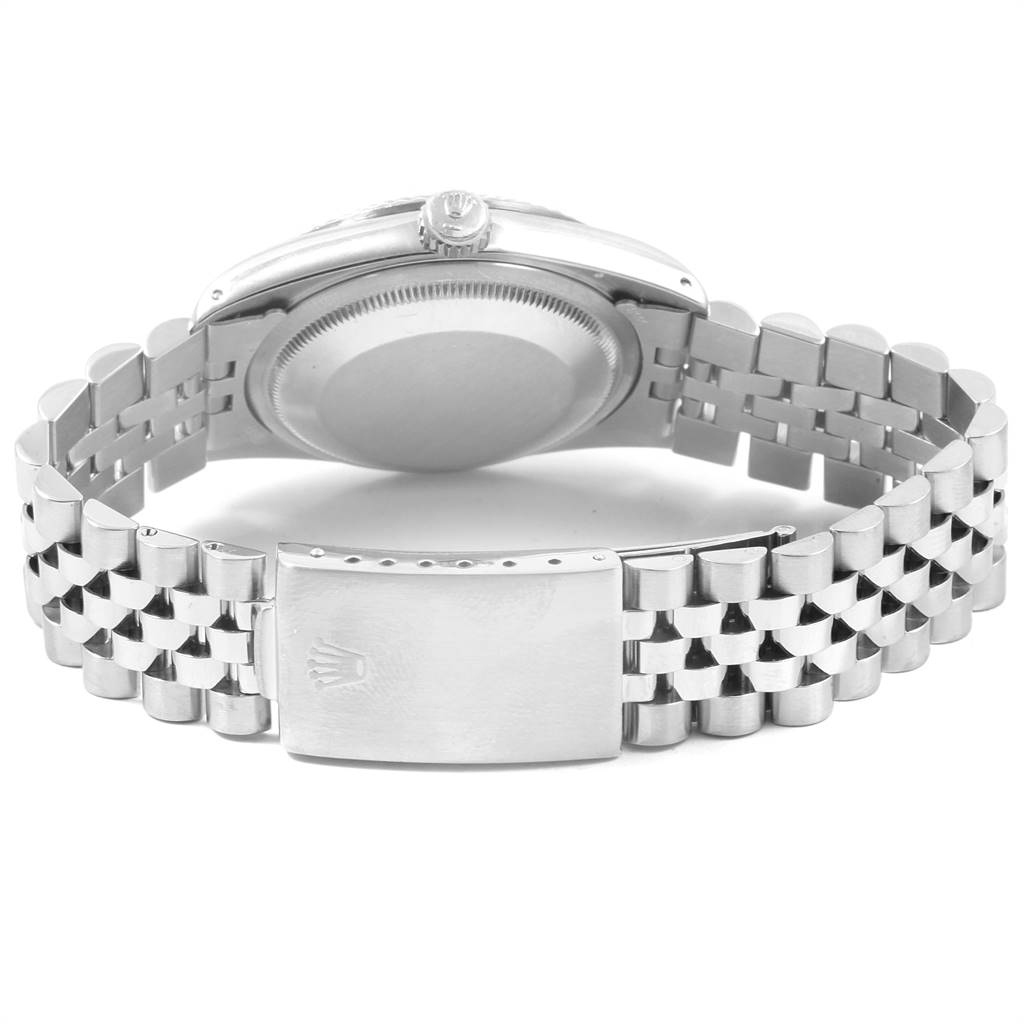 The image shows the back view of a Rolex Datejust 16234 Men's Stainless Steel Silver Dial 16234 Men's Stainless Steel Silver Dial watch, highlighting its case back, crown, and metal bracelet clasp.