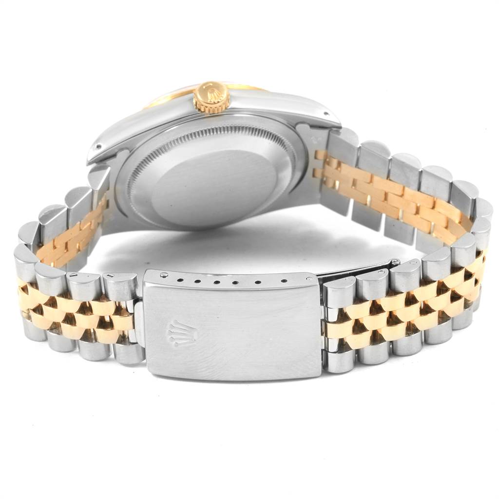 The image shows the back view of a Rolex Datejust 16233 Men's Steel and Gold (two tone) Beige Dial 16233 Men's Steel and Gold (two tone) Beige Dial watch, highlighting the case back and the two-tone Jubilee bracelet with clasp.