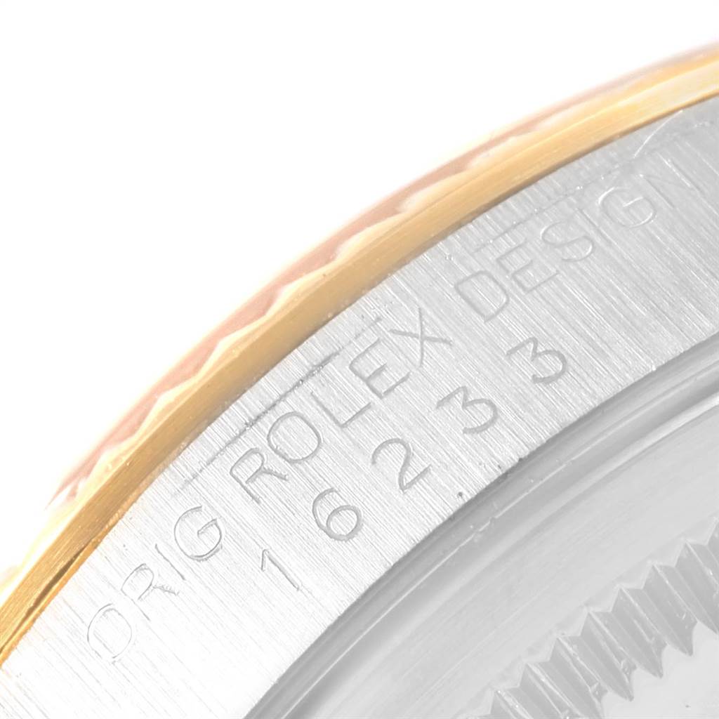 The image shows a close-up of the bezel and case side of a Rolex Datejust 16233 Men's Steel and Gold (two tone) Beige Dial 16233 Men's Steel and Gold (two tone) Beige Dial watch, highlighting the engraved model number.