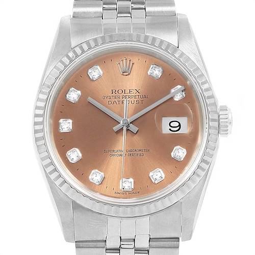 The image shows a frontal view of a Rolex Datejust 16234 Men's Stainless Steel Pink Dial 16234 Men's Stainless Steel Pink Dial watch with a pink dial, diamond hour markers, and a date window at 3 o'clock.