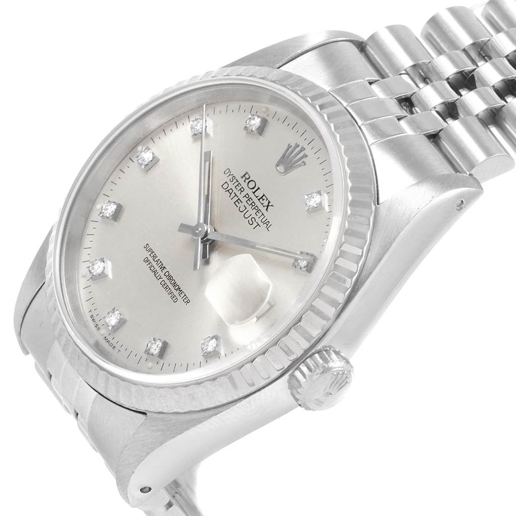 This image shows a close-up side angle of a Rolex Datejust 16234 Men's Stainless Steel Silver Dial 16234 Men's Stainless Steel Silver Dial watch, highlighting its face, bezel, crown, and part of the bracelet.