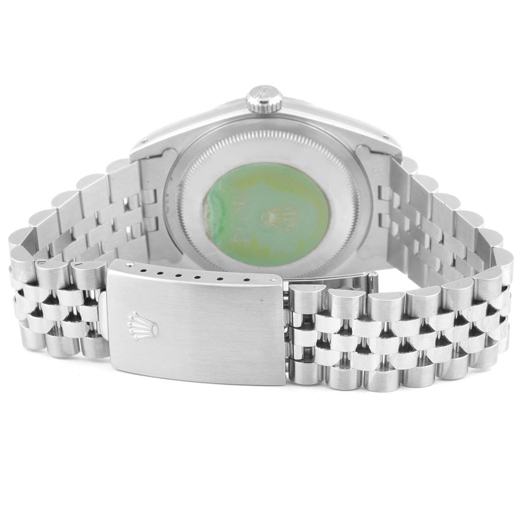 The image shows the back of a Rolex Datejust 16234 Men's Stainless Steel Silver Dial 16234 Men's Stainless Steel Silver Dial watch, focusing on its case back and metal bracelet clasp.