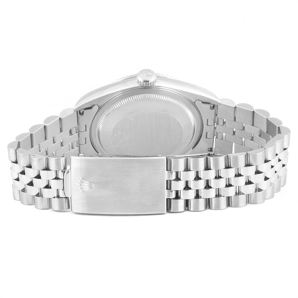 The image shows the back view of a Rolex Datejust 16234 Men's Stainless Steel Silver Dial 16234 Men's Stainless Steel Silver Dial watch, highlighting its bracelet and clasp.