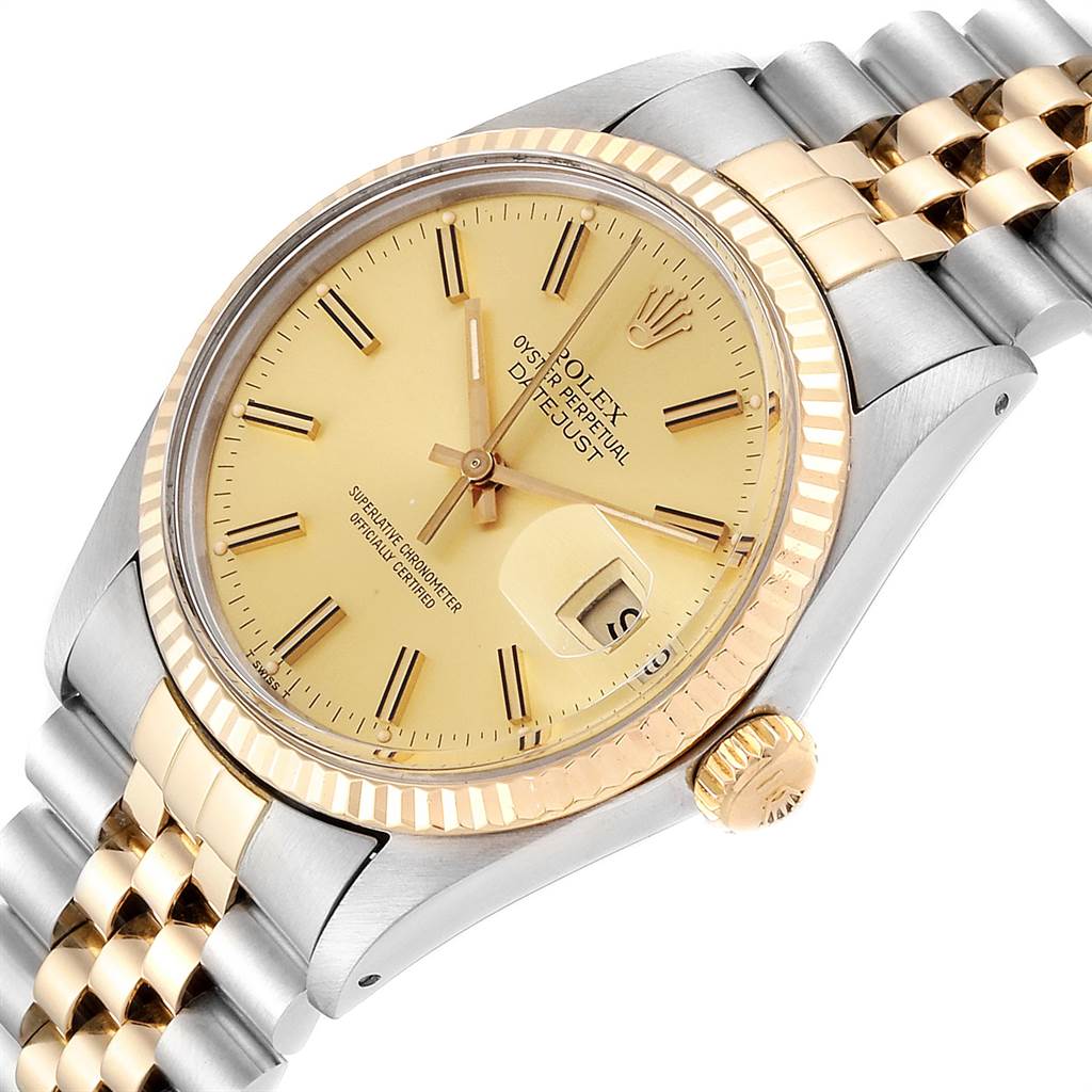 The Rolex Datejust 16013 Men's Steel and Gold (two tone) Champagne Dial 16013 Men's Steel and Gold (two tone) Champagne Dial watch is shown at a tilted angle, revealing the dial, bezel, crown, and part of the bracelet.