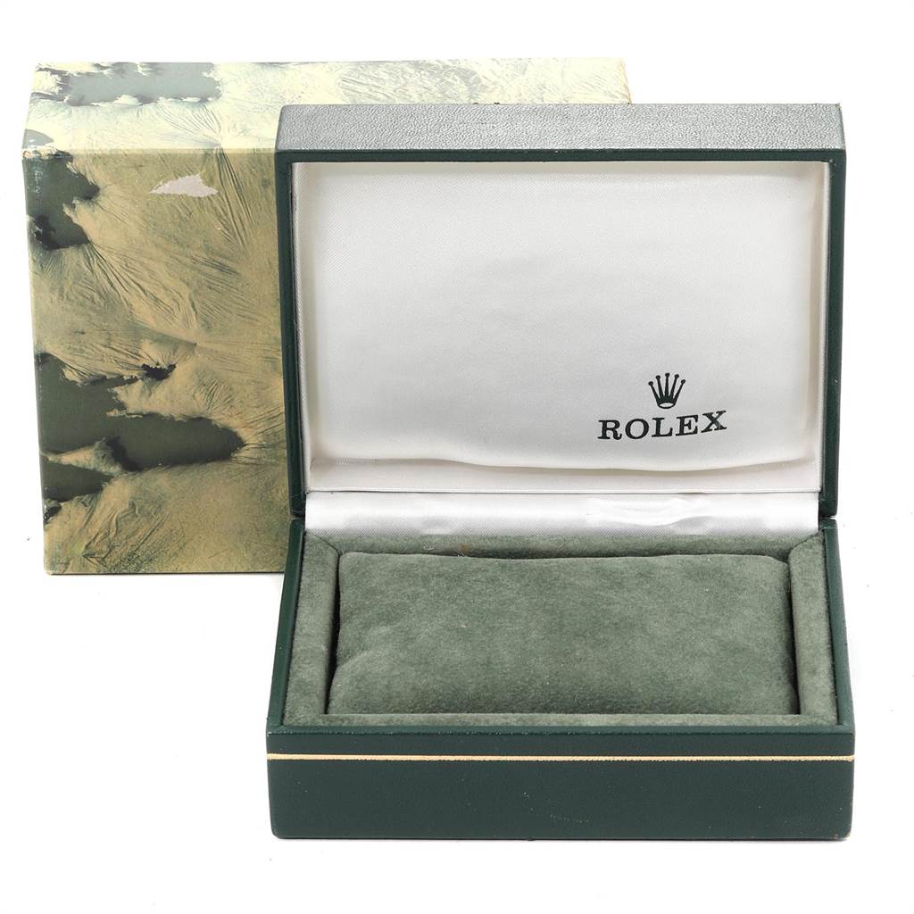 The image shows a Rolex Datejust 16013 Men's Steel and Gold (two tone) Champagne Dial 16013 Men's Steel and Gold (two tone) Champagne Dial watch box, opened, revealing a green cushion inside and the Rolex logo on the inner lid.