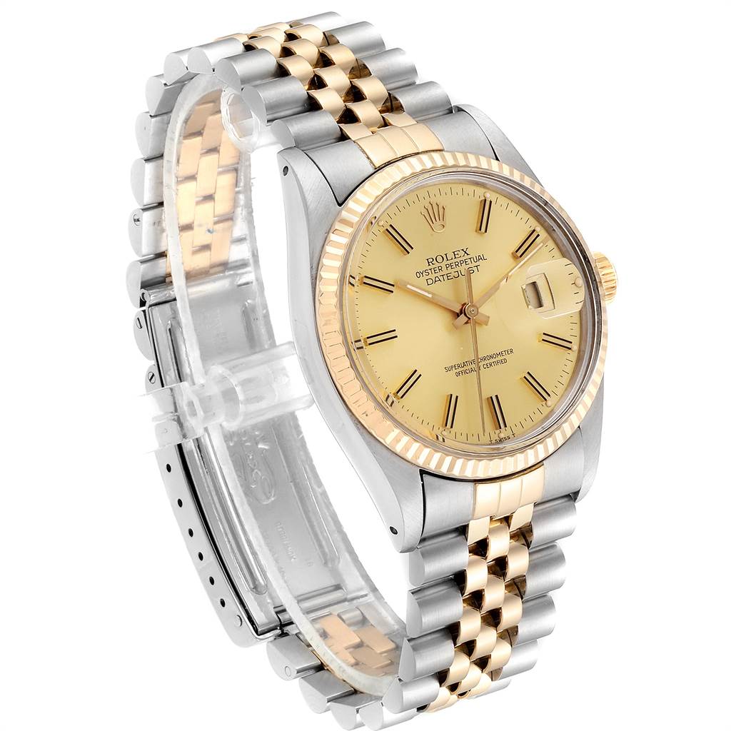 The Rolex Datejust 16013 Men's Steel and Gold (two tone) Champagne Dial 16013 Men's Steel and Gold (two tone) Champagne Dial watch is shown at a three-quarter angle, highlighting its two-tone bracelet and champagne dial.