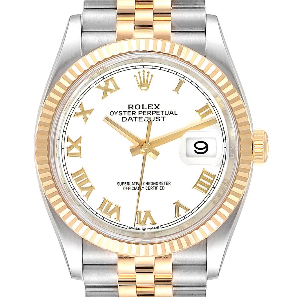 The image shows a close-up of a Rolex Datejust 126233 Men's Steel and Gold (two tone) White Dial 126233 Men's Steel and Gold (two tone) White Dial watch, highlighting its face, bezel, and part of the bracelet.