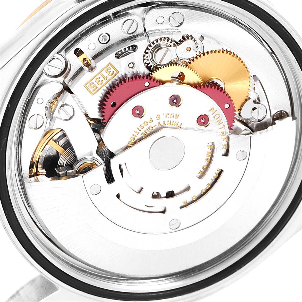 This image shows the internal mechanism and movement components of a Rolex Datejust 16233 Men's Steel and Gold (two tone) Champagne Dial 16233 Men's Steel and Gold (two tone) Champagne Dial watch from a back angle.