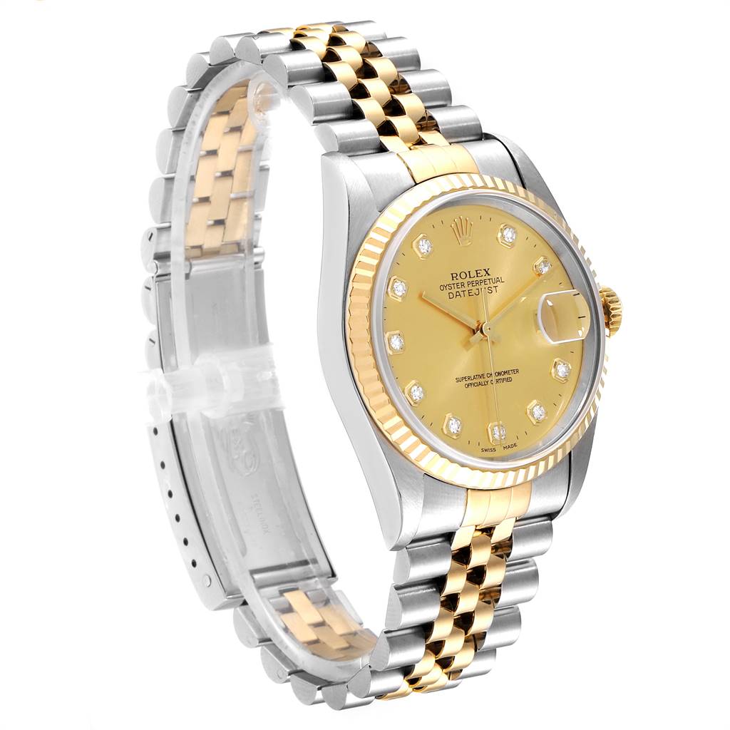 This Rolex Datejust 16233 Men's Steel and Gold (two tone) Champagne Dial 16233 Men's Steel and Gold (two tone) Champagne Dial watch is shown at a three-quarter angle, highlighting its two-tone bracelet, gold dial, and fluted bezel.
