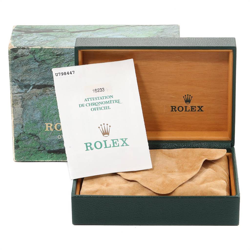 The image shows a Rolex Datejust 16233 Men's Steel and Gold (two tone) Champagne Dial 16233 Men's Steel and Gold (two tone) Champagne Dial watch box, its certificate, and a suede pouch, viewed from the front.