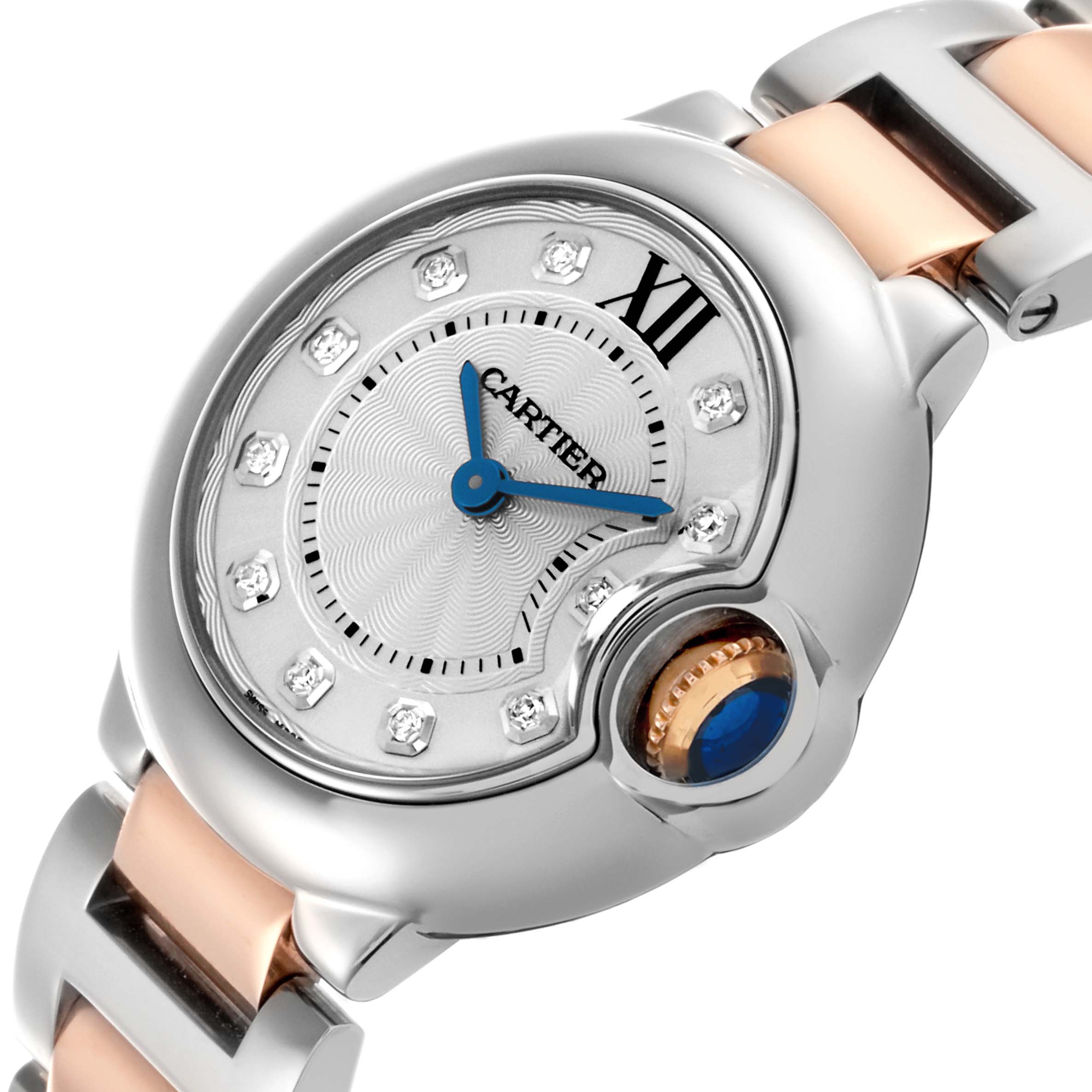The Cartier Ballon Bleu WE902030 Women's Steel and Gold (two tone) Silver Dial WE902030 Women's Steel and Gold (two tone) Silver Dial watch is shown at a slight angle, featuring its dial, blue hands, crown, and part of the metal bracelet.