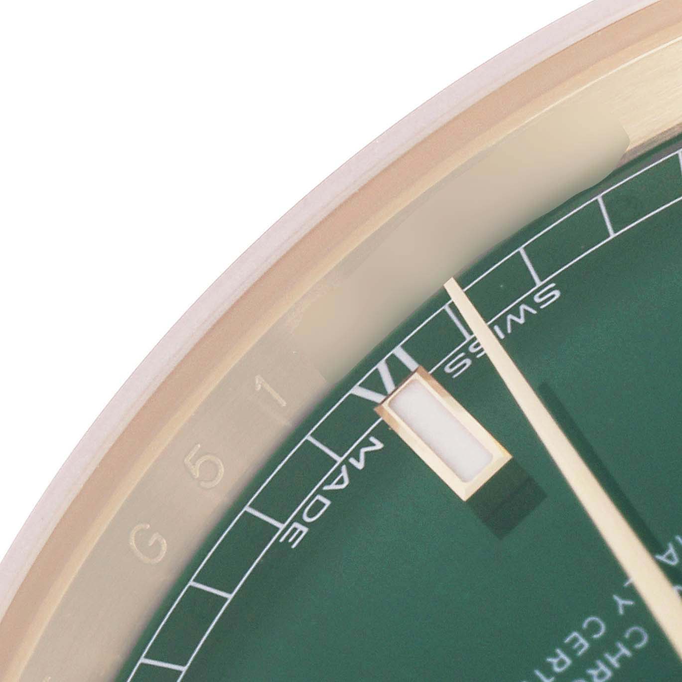 The image shows a close-up of the dial and markers of a Rolex President 118238 Men's Yellow Gold Green Dial 118238 Men's Yellow Gold Green Dial watch, focusing on the edge and minute markers.