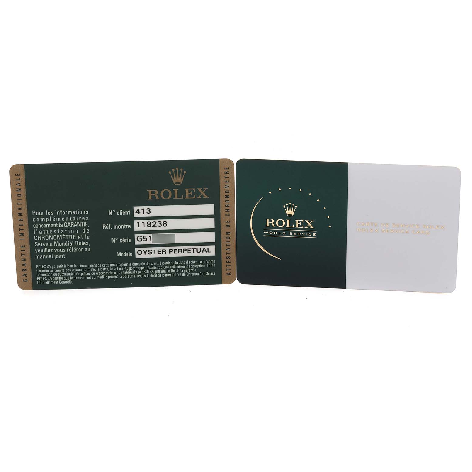 The image shows warranty cards for the Rolex President 118238 Men's Yellow Gold Green Dial 118238 Men's Yellow Gold Green Dial model, angled towards the viewer.