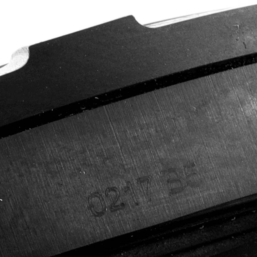 The image shows a close-up of the side of a Breitling Professional Series V73330 Men's Titanium Blue Dial V73330 Men's Titanium Blue Dial watch with the number "0217 35" engraved.