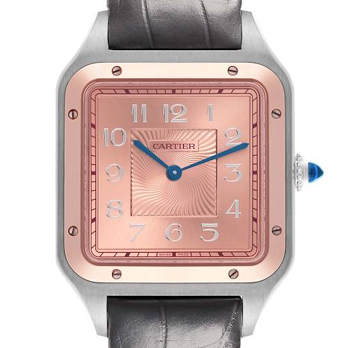 The Cartier Santos Dumont W2SA0025 Men's Steel and Gold (two tone) Pink Dial W2SA0025 Men's Steel and Gold (two tone) Pink Dial watch is shown from a front angle, highlighting the dial, crown, and black strap.