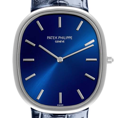 The image shows a Patek Philippe Golden Ellipse 5738P-001 Men's Platinum Blue Dial 5738P-001 Men's Platinum Blue Dial watch face from a front angle, highlighting the blue dial and silver markers.