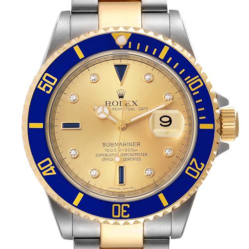 The Rolex Submariner 16613 Men's Steel and Gold (two tone) Champagne Dial 16613 Men's Steel and Gold (two tone) Champagne Dial watch is shown from the front, displaying its gold dial, blue bezel, and two-tone metal bracelet.