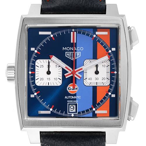 The image shows a front view of the Monaco model by Tag Heuer, displaying its square face, dial, subdials, and leather strap.