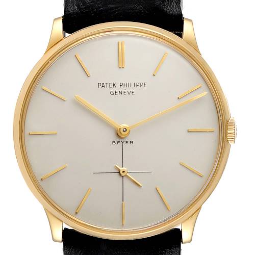 This image shows a frontal view of a Vintage Patek Philippe watch, highlighting the dial, hands, crown, and strap attachments.