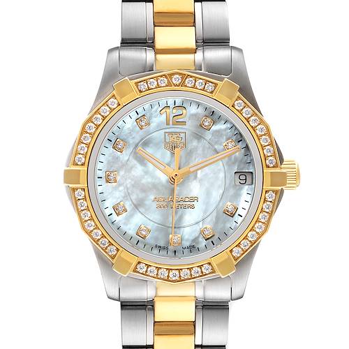 The Tag Heuer Aquaracer WAF1450.BB0820 Women's Steel and Gold (two tone) Mother of Pearl Dial WAF1450.BB0820 Women's Steel and Gold (two tone) Mother of Pearl Dial watch is shown from a front view, displaying its dial, bezel, and part of the bracelet.