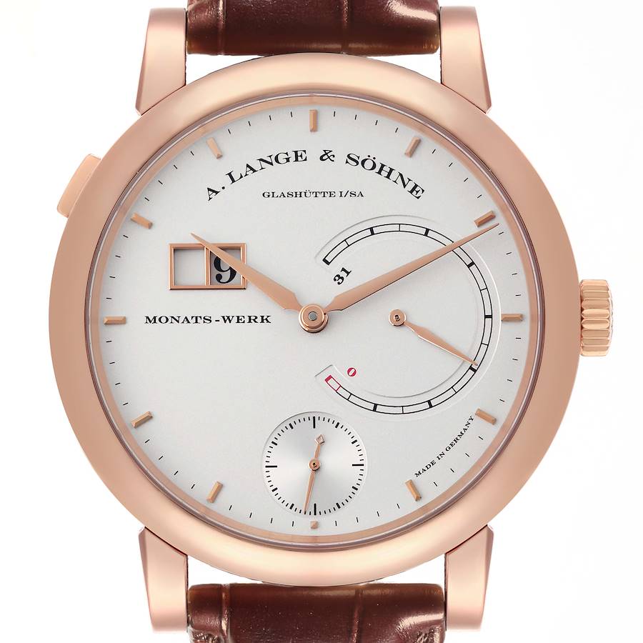 The A. Lange & Sohne Lange 1 130.032F Men's Rose Gold Silver Dial watch is shown from the front, highlighting its dial, hands, subdials, and brown strap.