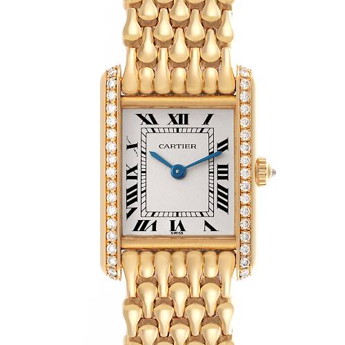 The Cartier Tank Louis WA2013K3 Women's Yellow Gold Silver Dial WA2013K3 Women's Yellow Gold Silver Dial watch is shown from a front angle, highlighting its rectangular case, Roman numeral dial, diamond bezel, and gold link bracelet.