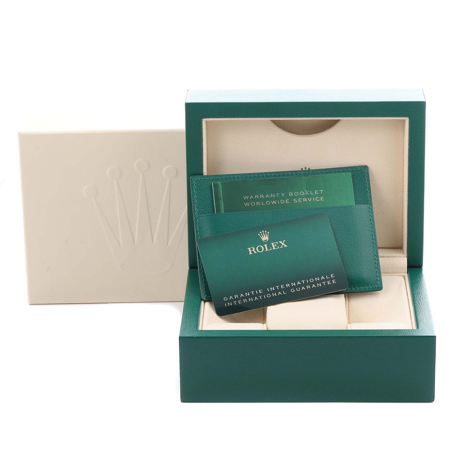 The Rolex Datejust packaging is shown open, displaying warranty booklets and an international guarantee card.