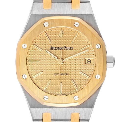 This image shows a frontal view of the dial, bezel, and part of the bracelet of an Audemars Piguet Royal Oak 14790SA Men's Steel and Gold (two tone) Champagne Dial 14790SA Men's Steel and Gold (two tone) Champagne Dial watch.