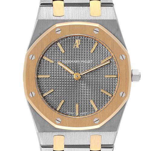 The image shows a close-up view of the dial, bezel, and part of the bracelet of a Royal Oak model by Audemars Piguet.