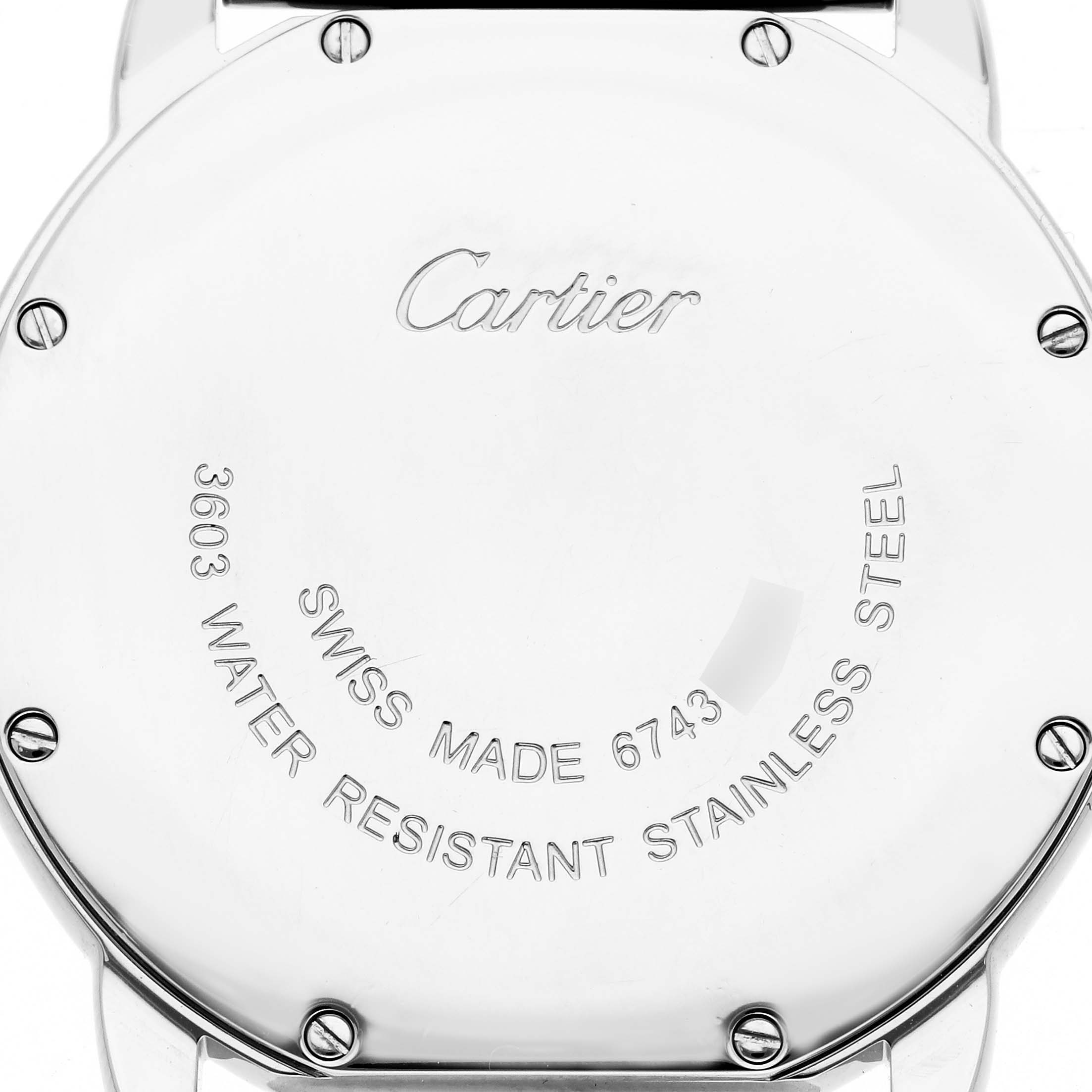 The image shows the back of a Cartier Ronde W6701005 Men's Stainless Steel Silver Dial W6701005 Men's Stainless Steel Silver Dial watch, highlighting its stainless steel case and inscriptions.
