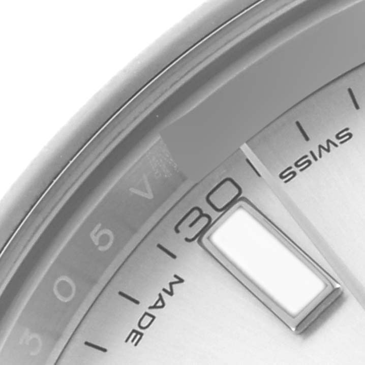 The image shows a close-up angle of a Rolex Datejust 41 116300 Men's Stainless Steel Silver Dial 116300 Men's Stainless Steel Silver Dial, highlighting part of the dial, markers, and date wheel.