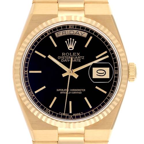 The Rolex Oysterquartz watch is shown from the front, displaying the dial, hands, day, date, bezel, case, and part of the bracelet.